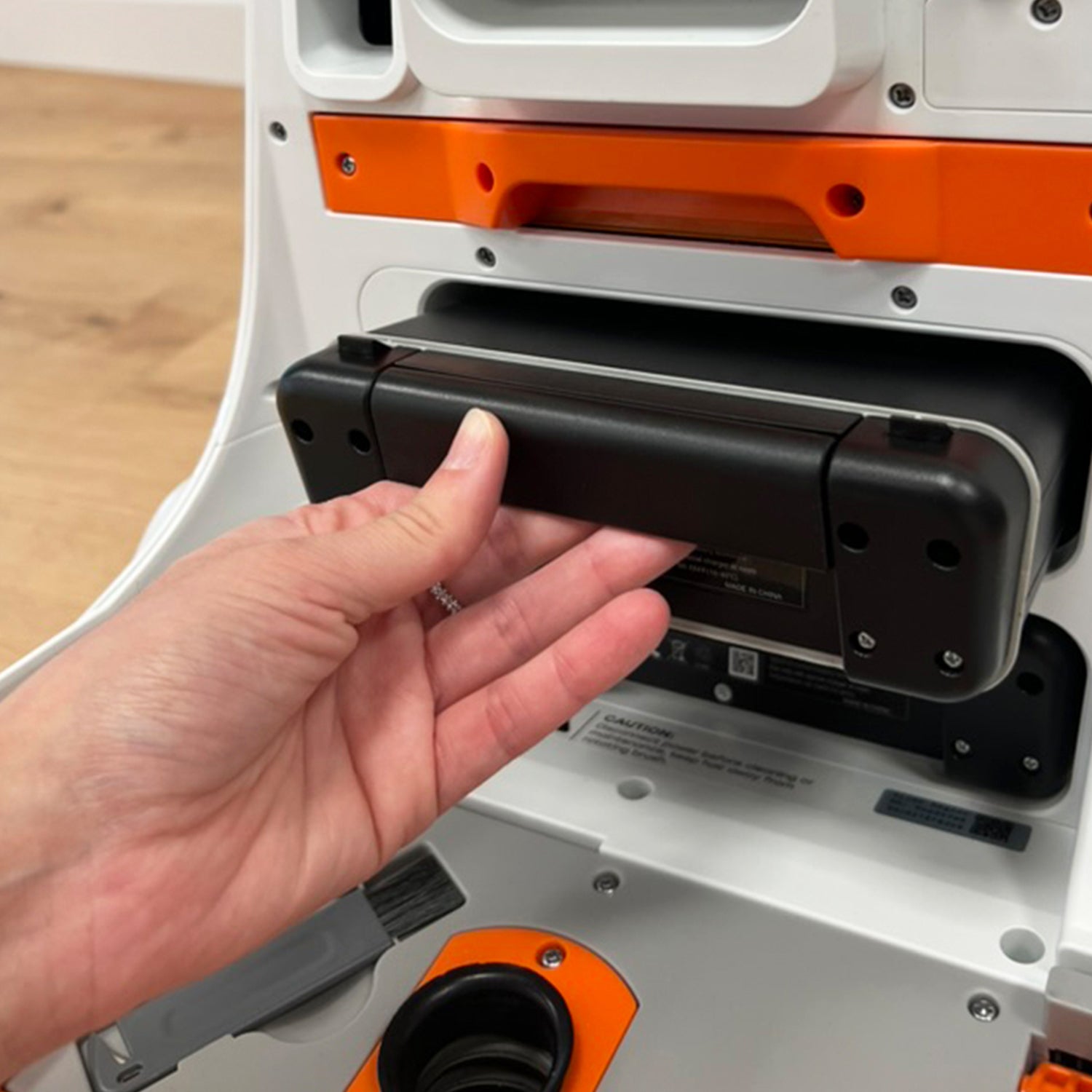 hand removing battery of robot